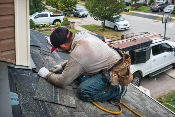 Professional Roofing technician working in Oswego, NY